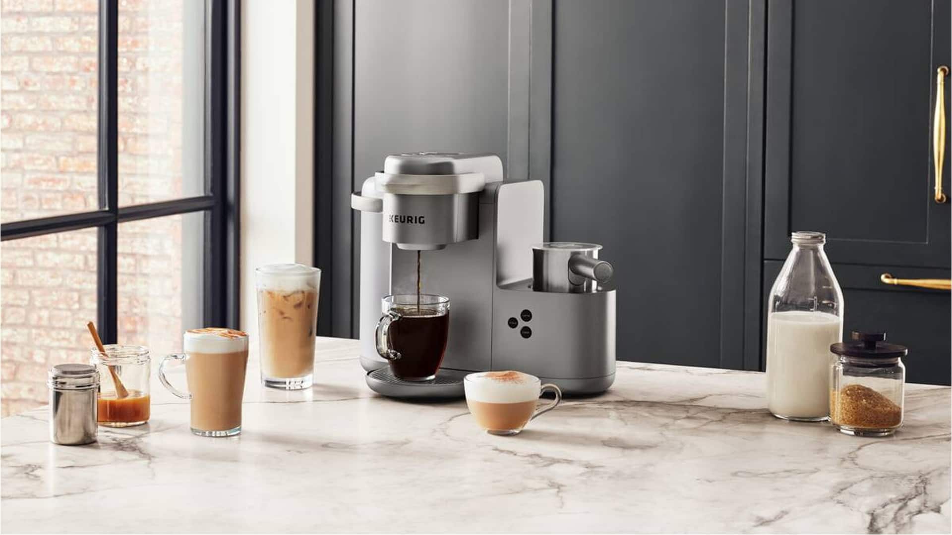 Keurig coffee and espresso maker on a counter top with a variety of coffee types, a good alternative to the breville pro espresso machines