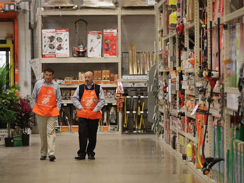 two home depot workers inside the store